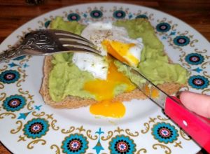 soft poached eggs on avocado toast